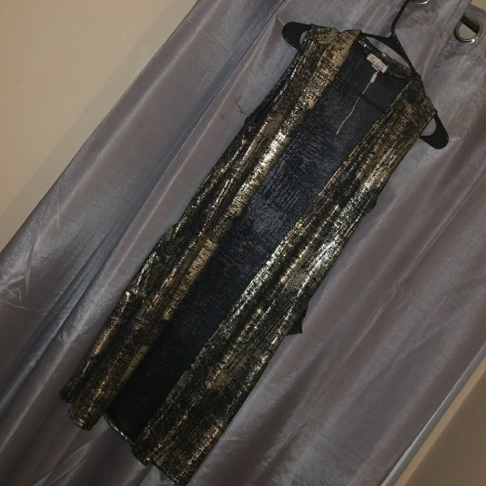 Gold shimmery vest 🕶